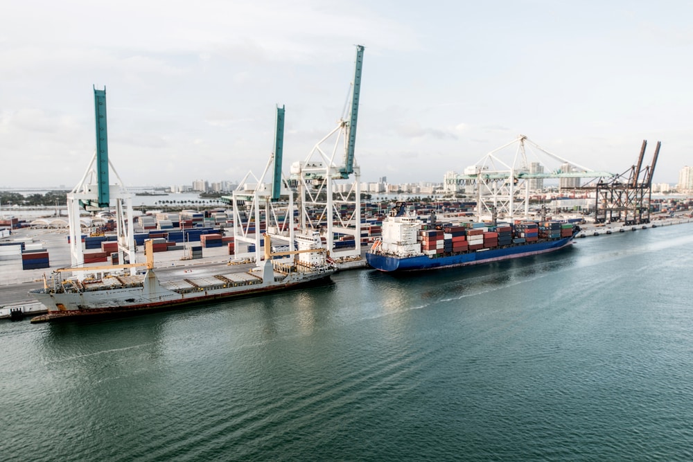 International logistics containers being loaded onto a cargo ship